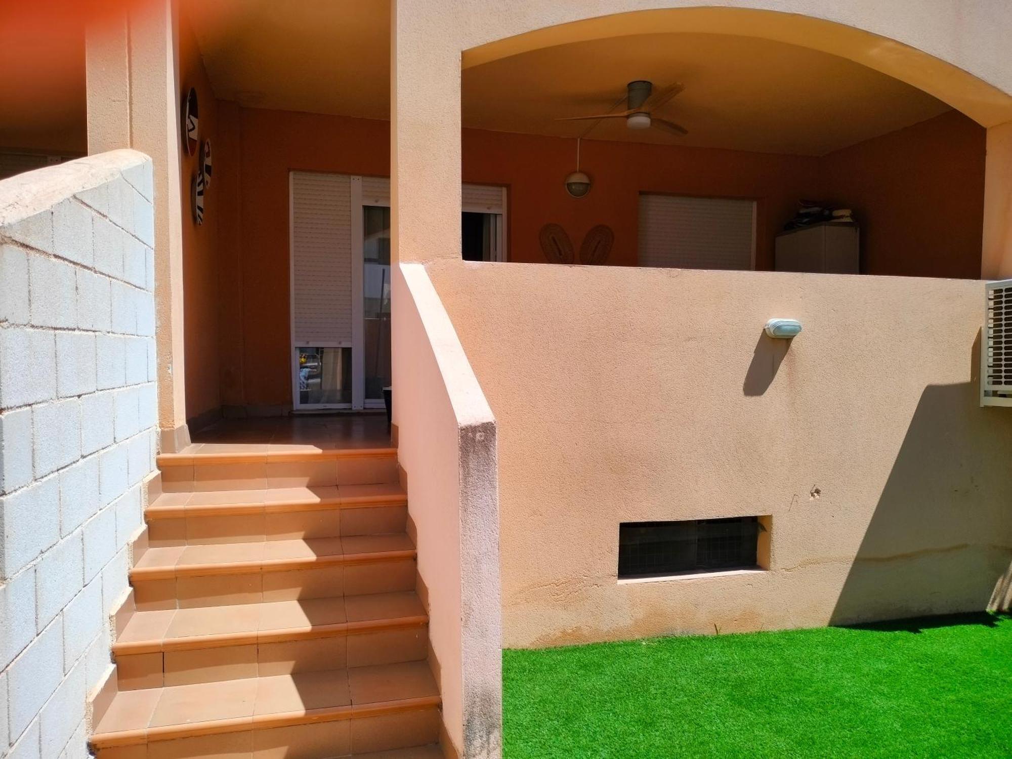 Bajo Con Jardin A Pie De Playa Y Piscina Comunitaria Con Jacuzzi Apartman Playas de Vera Kültér fotó