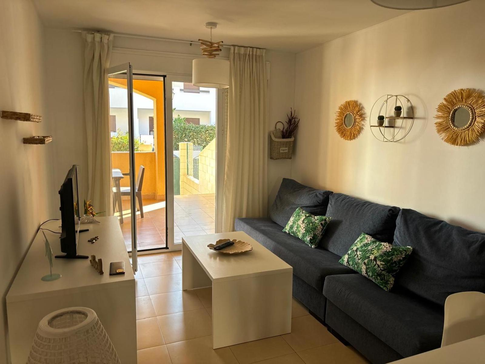 Bajo Con Jardin A Pie De Playa Y Piscina Comunitaria Con Jacuzzi Apartman Playas de Vera Kültér fotó