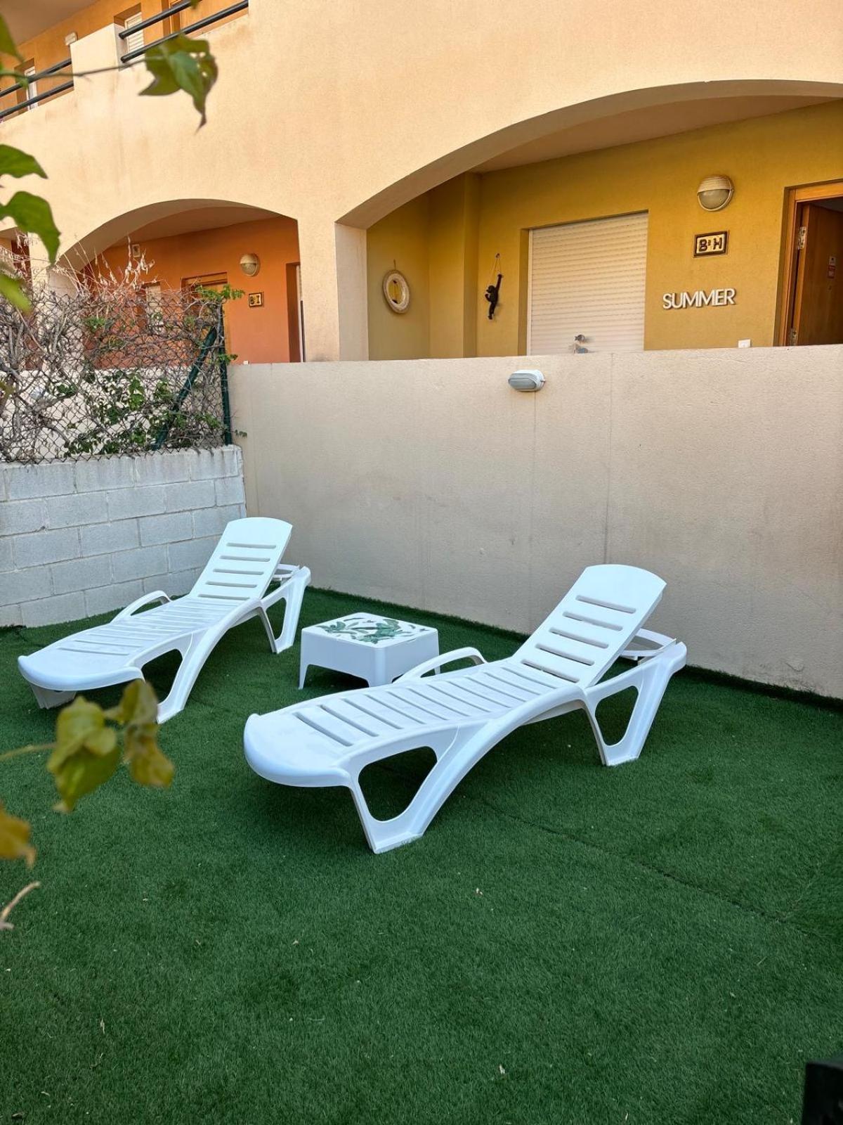 Bajo Con Jardin A Pie De Playa Y Piscina Comunitaria Con Jacuzzi Apartman Playas de Vera Kültér fotó