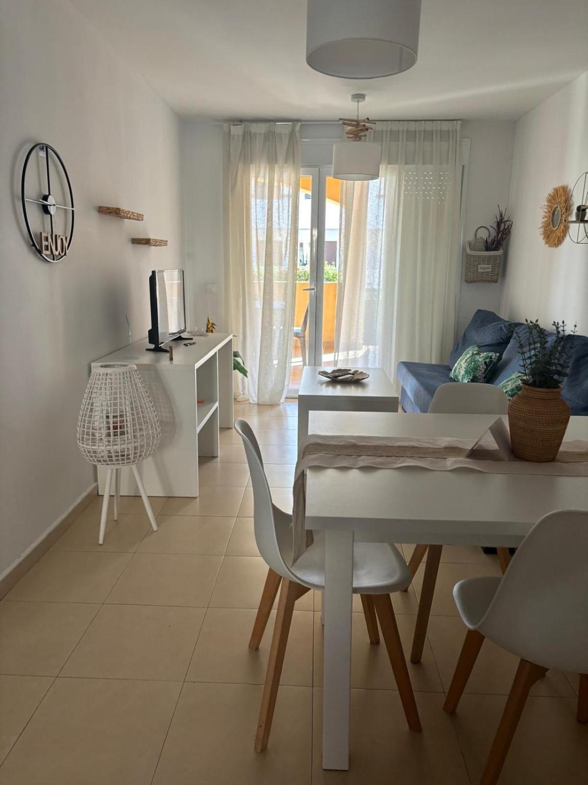 Bajo Con Jardin A Pie De Playa Y Piscina Comunitaria Con Jacuzzi Apartman Playas de Vera Kültér fotó
